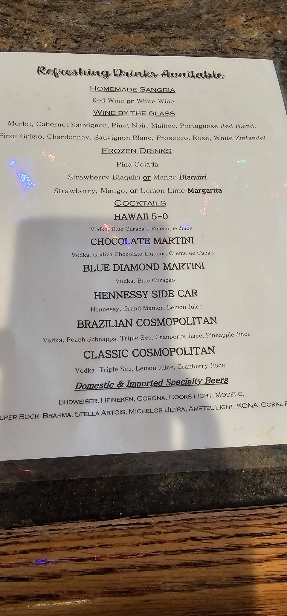Printed menu for Portuguese seafood and meat dishes.