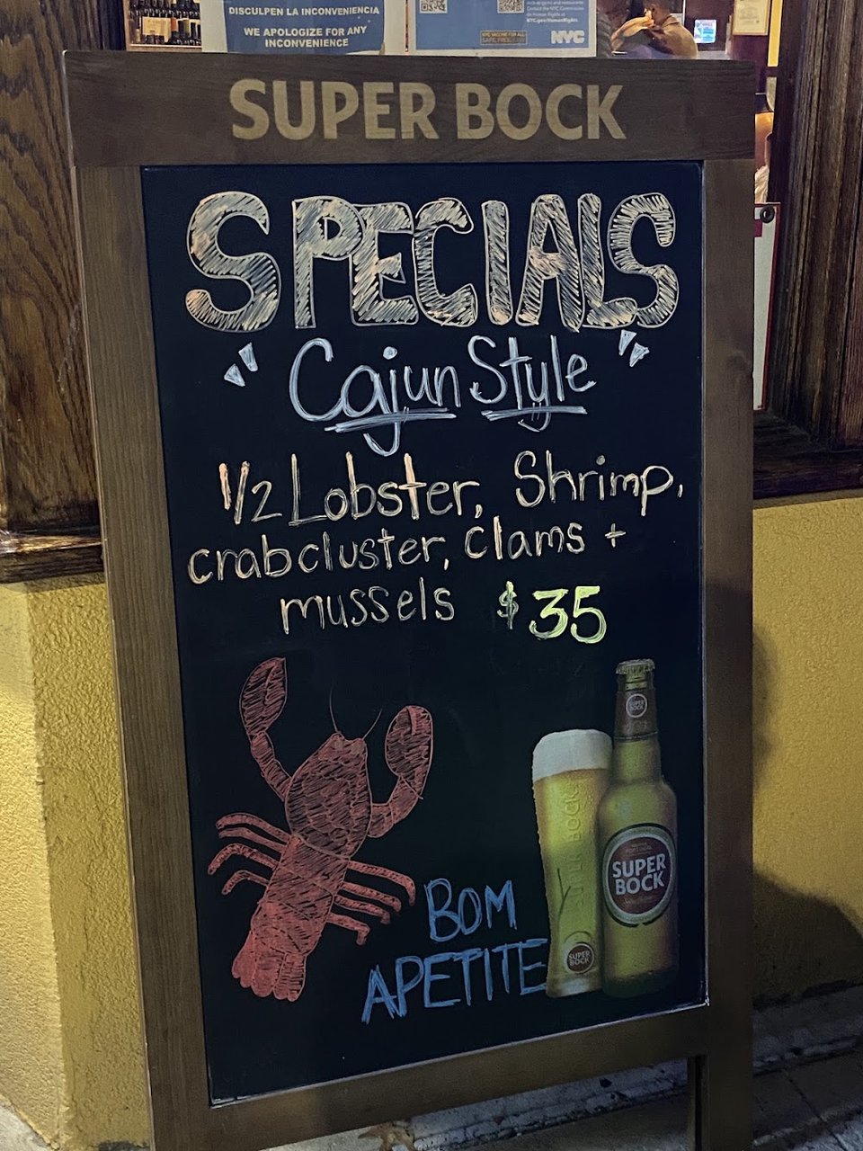 Food menu showing meats and house specialties.